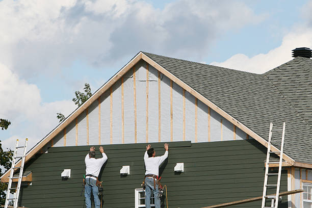 Professional Emergency Siding Repair technician working in Seville, OH